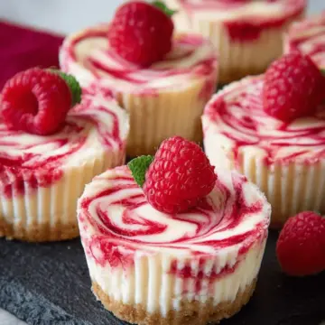 Raspberry Swirled Mini Cheesecakes